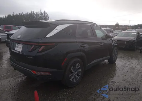 2022 Hyundai Tucson Hybrid Blue z USA, uszkodzony, nr VIN KM8JBCA15NU035992